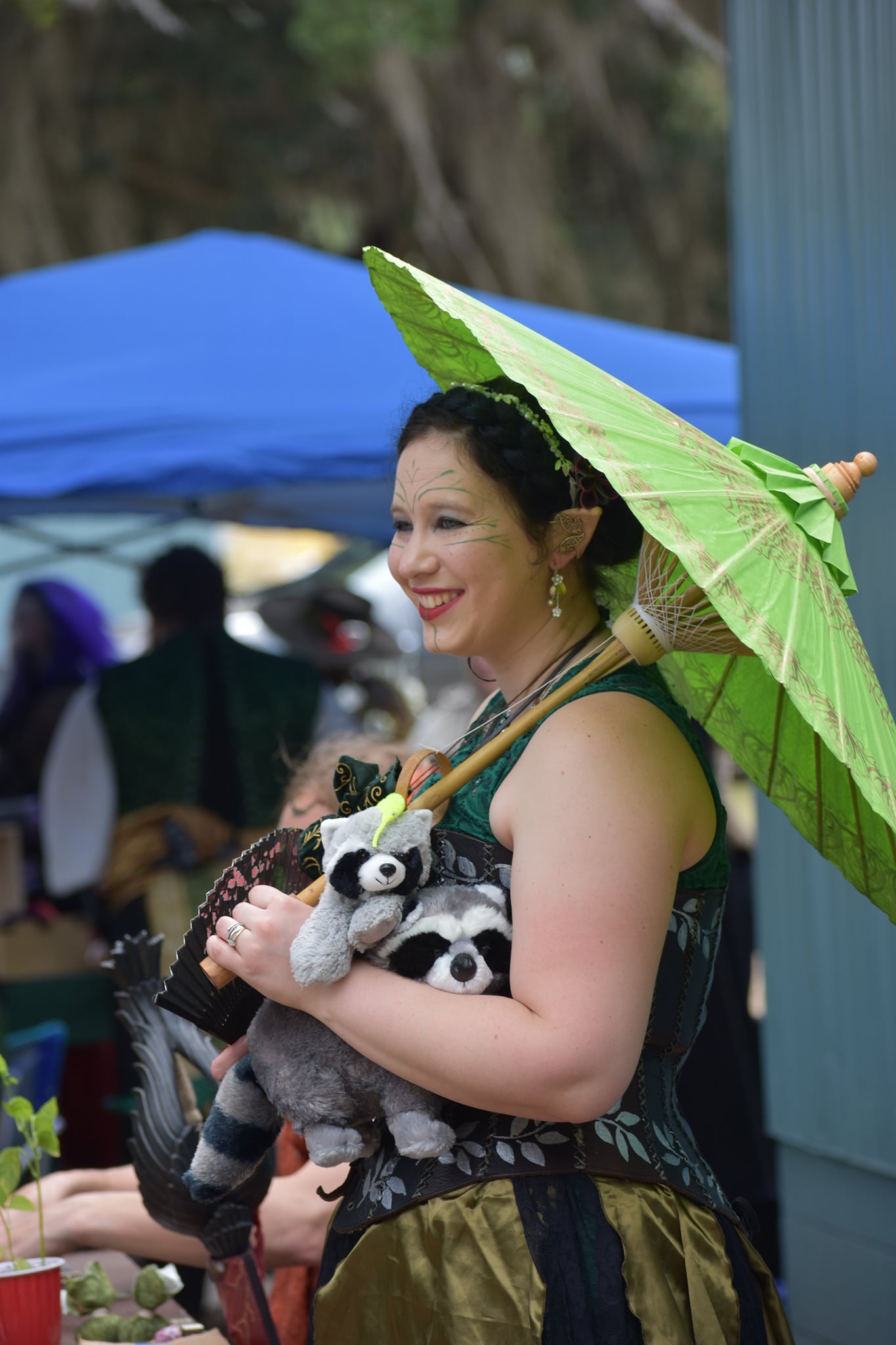 A Sylvan And Her Racoons